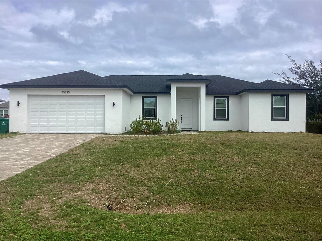 Photo of 15795 Stuart Circle, Port Charlotte, FL 33981 (MLS # A4711543)