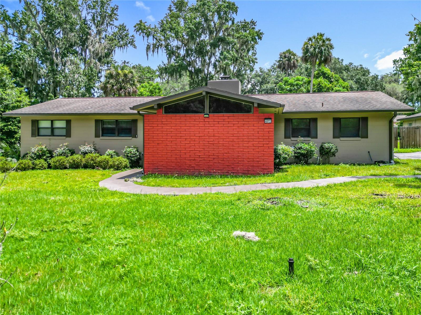 Spacious 3 bedroom, 2 bath home with a fenced yard, family room, and a versatile bonus room—perfect as an office, extra bedroom, or additional living space. Includes a laundry room and a detached in-law suite featuring 1 bedroom, 1 bath, a kitchenette, and living area. Great setup for extended family or guests. Conveniently located near schools, shopping, and main roads.