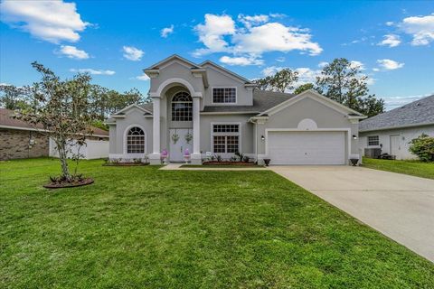 Photo of 21 Whittingham Lane, Palm Coast, FL 32164 (MLS # FC308960) Photo of 21 Whittingham Lane, Palm Coast, FL 32164 (MLS # FC308960)