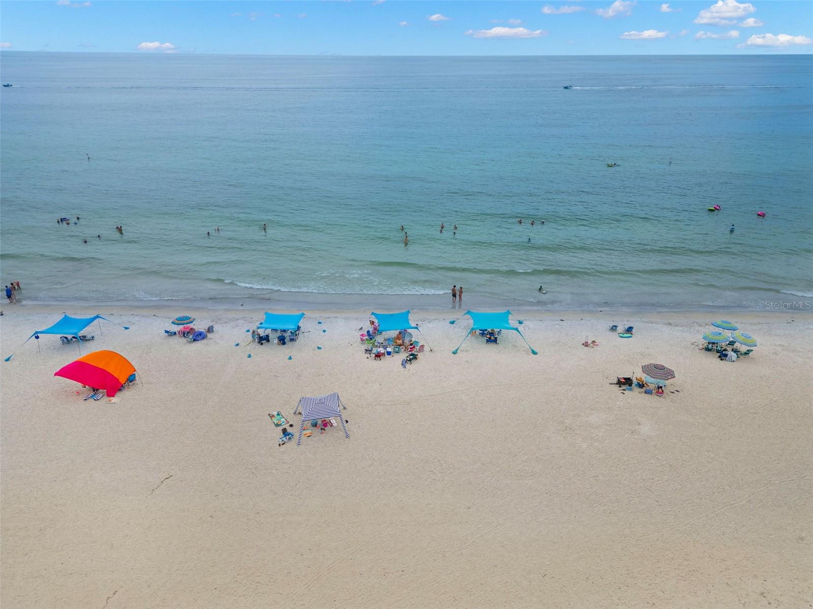 Under contract-accepting backup offers. AMAZING GULF FRONT INCOME PROPERTY! $127,000.00 IN 2025 RENTALS. IT IS ALREADY BOOKED THROUGH THE END OF THE YEAR! PURCHASE FOR A GREAT INVESTMENT & USE FOR YOURSELF AS YOU LIKE! 1380 SF, “ TURN KEY”, BEAUTIFUL 3 BEDROOM, 2 BATH UPDATED & ON THE 3RD FLOOR SO THE ELEVATION PROTECTS YOUR PROPERTY. NO FLOOD DAMAGE TO THIS CONDO DURING THE STORMS! WAIT UNTIL YOU SEE THIS ONE! WHEN YOU WALK INTO THIS BEAUTIFULLY UPDATED FURNISHED CONDO YOU ARE DRAWN TO OPEN THE SLIDING DOORS AND TAKE IN YOUR STRAIGHT ON VIEW OF THE GULF! LARGE 12.7 X 7.10 BALCONY WITH LOUNGE FURNITURE FOR ENJOYING YOUR WONDERFUL VIEWS! THERE IS ROOM FOR A TABLE & CHAIRS TO DINE OUTSIDE OVERLOOKING THE BEACH. MATCHING LUXURY VINYL FLOORING THOUGHOUT. SPACIOUS LIVING ROOM AREA WITH PLENTY OF ROOM FOR FAMILY OR GUEST SEATING & OPEN TO THE DINING ROOM AND KITCHEN. THIS OPEN FLOOR PLAN ALLOWS FOR FOR 6 AT THE DINING ROOM TABLE PLUS SEVERAL PEOPLE AT THE BAR. AMAZING LARGE KITCHEN INCLUDING WHITE SOFT CLOSE CABINETRY WITH PULL OUTS & WONDERFUL WHITE QUARTZ COUNTERTOPS, STAINLESS STEEL APPLIANCE PACKAGE & LARGE KITCHEN ISLAND WITH SEATING. THERE IS A SEPARATE CLOSET FOR PANTRY ITEMS & STORAGE. THE SPACIOUS PRIMARY ON-SUITE IS INVITING WITH KING BED, DRESSERS, WALK-IN CLOSET & ON SUITE BATH. THE BATH IS GORGEOUS WITH WHITE CABINETRY, DOUBLE SINKS & SHOWER/TUB COMBINATION. THE SPLIT FLOOR PLAN HAS THE GUEST ROOMS DOWN THE HALL. THE FIRST GUEST ROOM SLEEPS 4 PEOPLE WITH 2 BUNK BEDS & A QUEEN BED. IT IS SO NICE & GREAT FOR GUESTS & CHILDREN. THE THIRD BEDROOM IS BEAUTIFUL WITH ITS KING BED, DRESSERS & WALK IN CLOSET. THE UPDATED BATH IS JUST ACROSS THE HALL WITH A STUNNING LARGE GLASS SHOWER & QUARTZ SURROUND. THE SINK ALSO HAS A QUARTZ COUNTERTOP. THE FULL LAUNDRY ROOM IS DOWN THIS HALLWAY & HAS A FULL SIZE WASHER & DRYER. THERE IS A STORAGE SPACE FOR YOUR UNIT DOWNSTAIRS & AN UNDER BUILDING GARGAGE AREA WITH YOUR PARKING SPACE. GUEST PARKING IS IN THE SPACES OUTSIDE THE GARAGE. THE LOCATION IS AMAZING! CLOSE TO RESTAURANTS, WINE BARS, ENTERTAINMENT & SHOPPING. BEING ABLE TO WALK TO EVERYTHING IN INDIAN ROCKS BEACH IS OUTSTANDING! CALL TODAY THIS WILL SELL FAST!