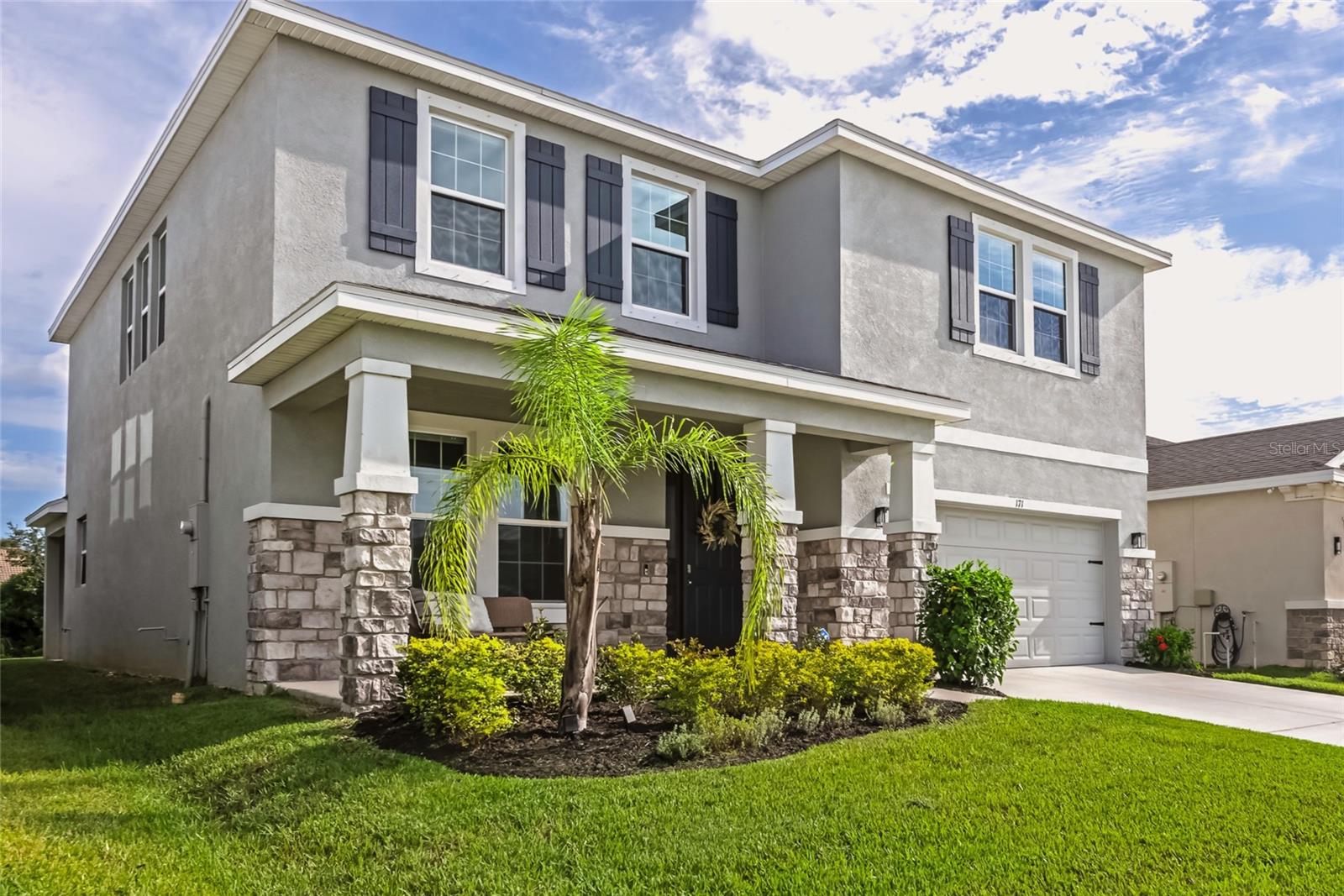 Welcome to 171 Bright Ibis, a spacious and beautifully designed home in the desirable community of Mangrove Manor. Offering a thoughtful floor plan with 4 bedrooms, a dedicated office, a versatile loft, and abundant storage throughout, this residence was built for both comfort and functionality. The heart of the home is the open-concept living area, where natural light pours in and highlights the chef-inspired kitchen complete with a walk-in pantry, stainless steel appliances, quartz countertops, and an oversized island perfect for gatherings. Just off the garage entry, you’ll find a convenient mudroom, adding everyday ease and organization. Upstairs, the loft provides flexible space—ideal as a media room, playroom, or additional lounge area. The primary suite serves as a true retreat, featuring a spa-like bath with dual vanities, a large shower, and a generous walk-in closet. Three additional bedrooms offer plenty of space for family and guests, while the dedicated home office ensures productivity and privacy. Outside, enjoy your private covered lanai and backyard, ready to be transformed into the outdoor living space of your dreams. Thoughtful details such as extra closets and smart storage solutions make this home stand out. Located in the vibrant community of Mangrove Manor, you’ll enjoy close proximity to shopping, dining, and world-class Gulf Coast beaches, along with low HOA fees and a welcoming neighborhood feel. This home truly has it all—space, style, and convenience. Don’t miss your chance to make 171 Bright Ibis yours.
