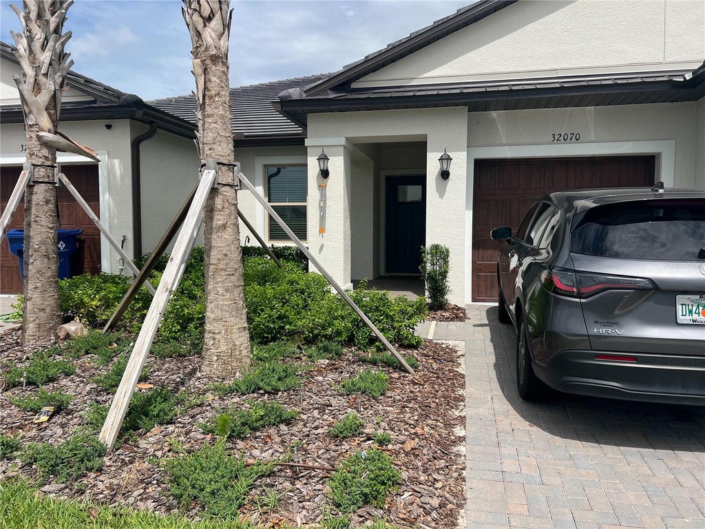 Photo of 32070 Griffin Sands Lane, San Antonio, FL 33576 (MLS # TB8516525)