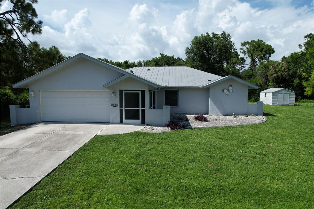 Photo of 13462 Long Avenue, Port Charlotte, FL 33953 (MLS # C7513272)