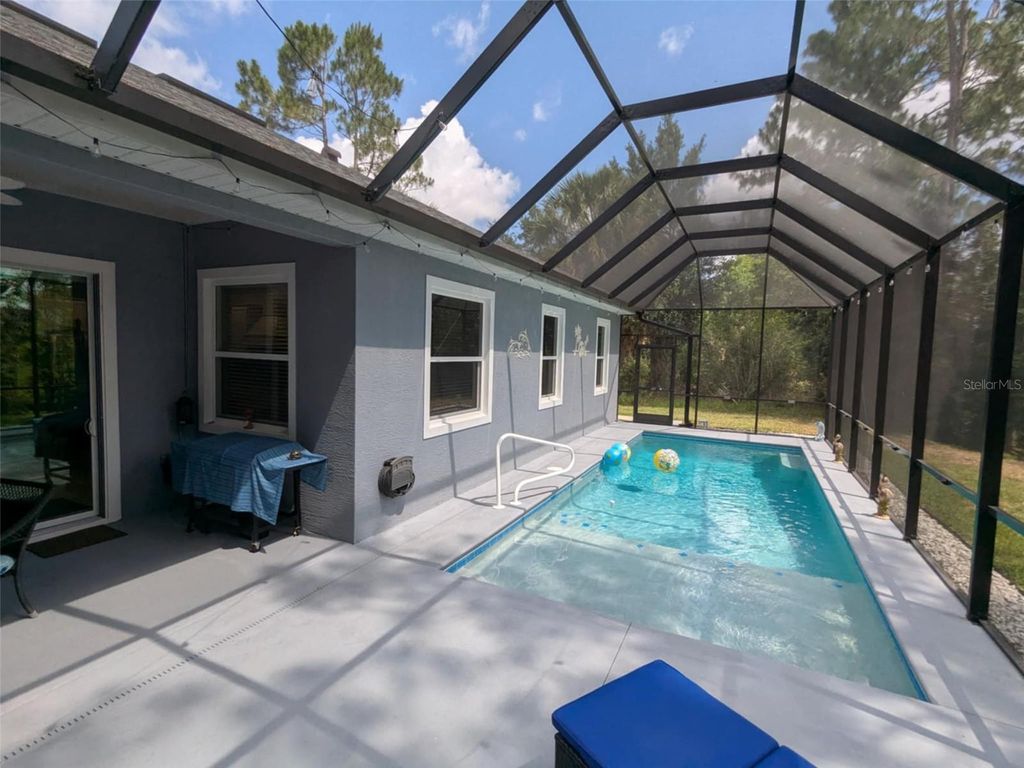 Photo of 52 Bud Hollow Drive, Palm Coast, FL 32137 (MLS # FC316079)
