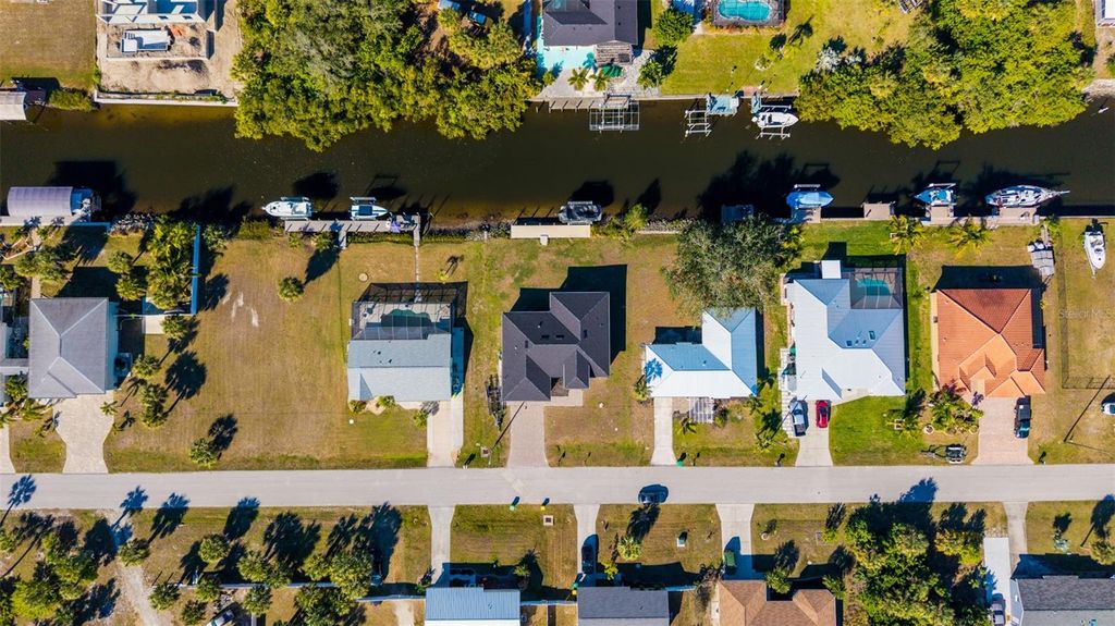 Photo of 18946 Ayrshire Circle, Port Charlotte, FL 33948 (MLS # A4678804)