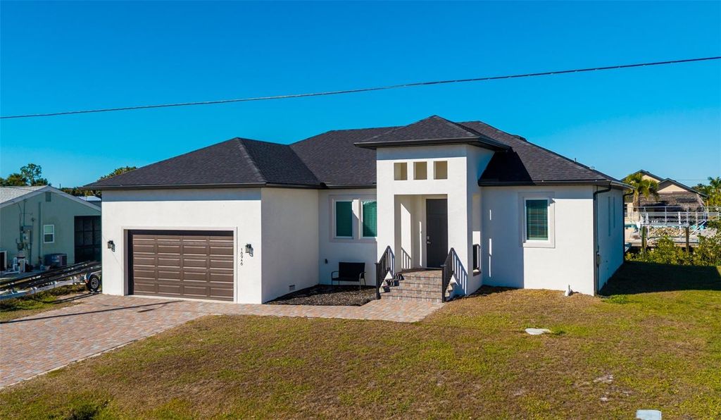 Photo of 18946 Ayrshire Circle, Port Charlotte, FL 33948 (MLS # A4678804)