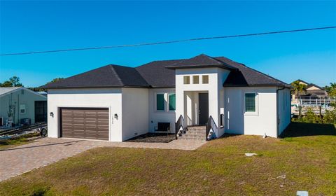 Photo of 18946 Ayrshire Circle, Port Charlotte, FL 33948 (MLS # A4678804)