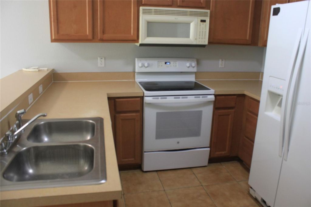 Photo of 669 Cresting Oak Circle #30, Orlando, FL 32824 (MLS # O6428303)