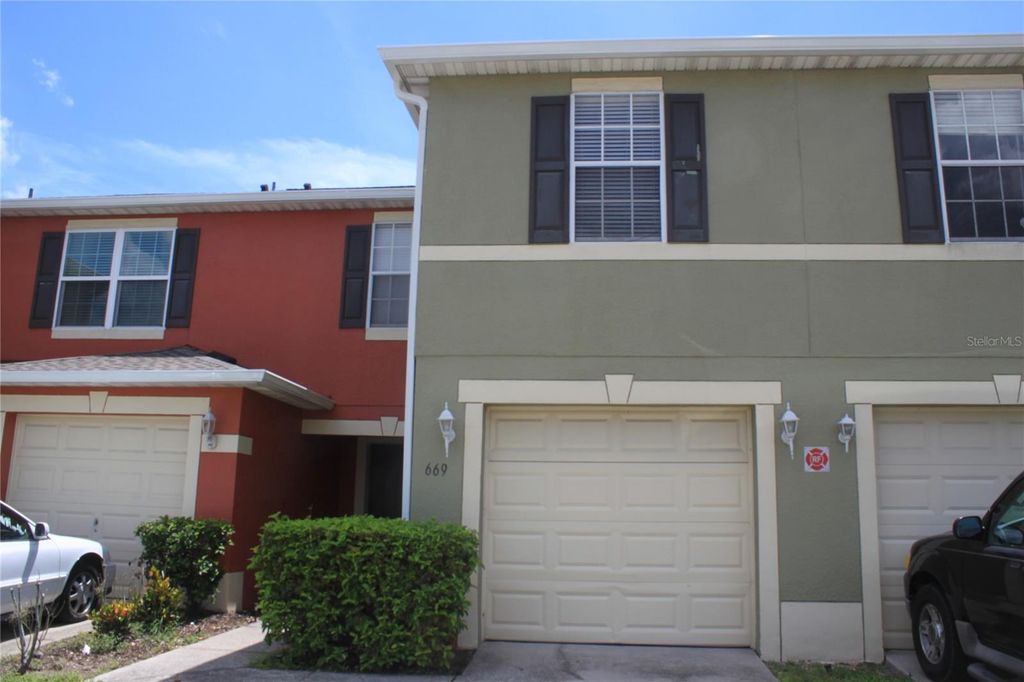 Photo of 669 Cresting Oak Circle #30, Orlando, FL 32824 (MLS # O6428303)
