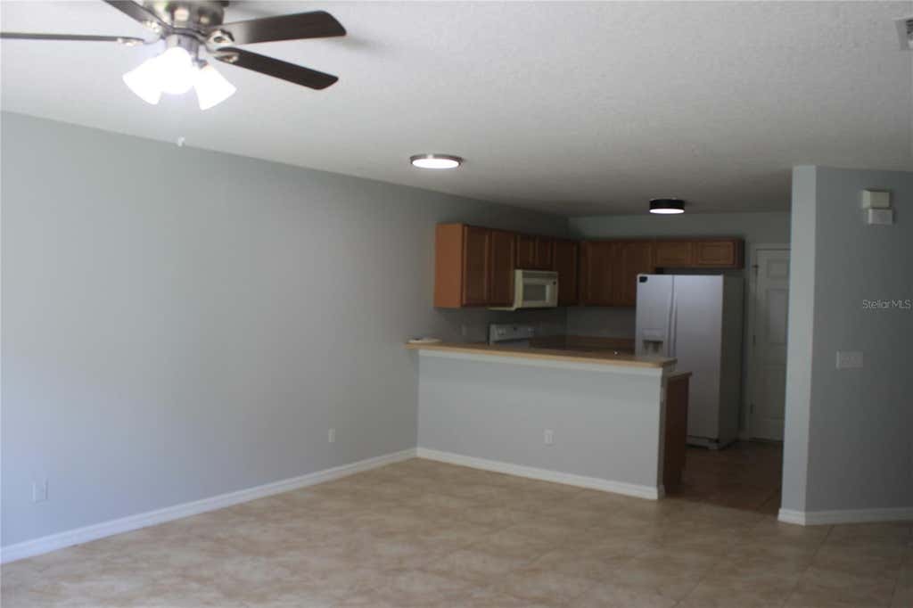 Photo of 669 Cresting Oak Circle #30, Orlando, FL 32824 (MLS # O6428303)
