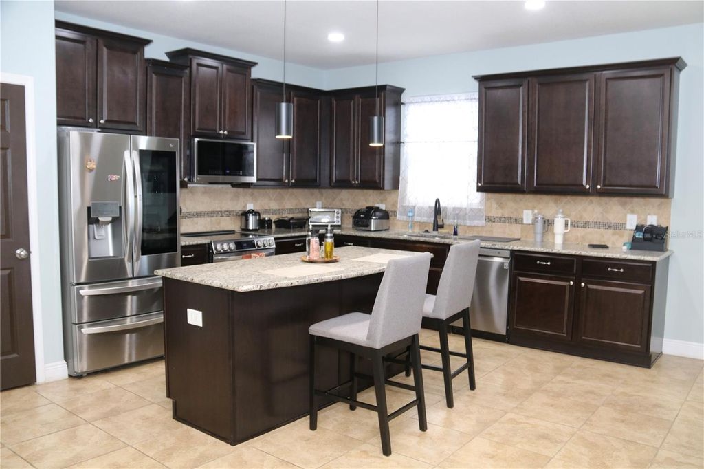 Photo of 707 Petal Mist Lane, Brooksville, FL 34604 (MLS # TB8466184)