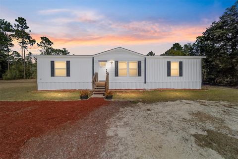 Photo of 18427 SW 60th Street, Dunnellon, FL 34432 (MLS # OM717257)