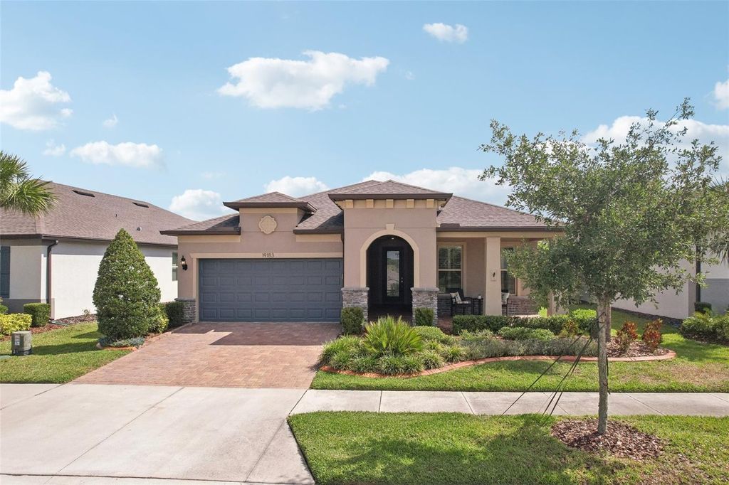 Photo of 19183 Coastal Shore Terrace, Land O Lakes, FL 34638 (MLS # TB8388841)