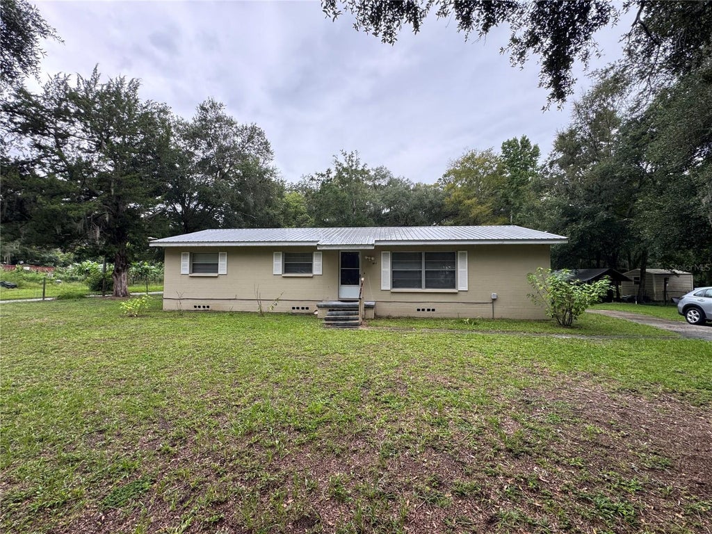 Photo of 602 N Division Street, Micanopy, FL 32667 (MLS # TB8550540)