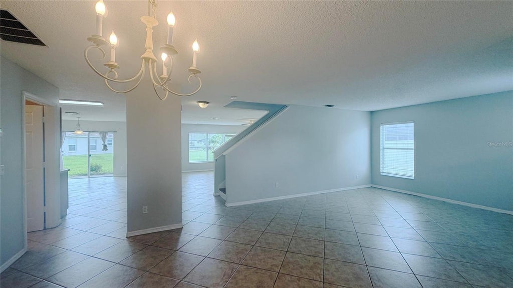 Photo of 831 Horseshoe Falls Drive, Orlando, FL 32828 (MLS # O6438467)