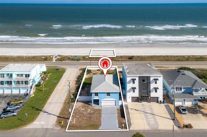 Embracing the rhythm of the Atlantic and the laid-back elegance of Flagler Beach, this exceptional coastal residence spans two parcels along South Ocean Shore Boulevard, including a separate oceanfront parcel directly across the street—offering a rare opportunity to preserve your view and beach access. This solid concrete block home encompasses 1,860 square feet with three bedrooms and three bathrooms, thoughtfully designed and upgraded to reflect the relaxed sophistication of refined beachside living. Light-filled interiors and an intuitive layout create a natural flow throughout the living spaces, ideal for both everyday comfort and effortless entertaining. Generously proportioned bedrooms provide versatility for guests, work-from-home needs, or a serene coastal retreat. The design embraces indoor-outdoor living, welcoming ocean breezes and natural light while enhancing the home’s connection to its surroundings. Enjoy the native beach sunflower gardens in the large fenced backyard or there is plenty of room to add a pool!  This distinctive two-parcel offering elevates the coastal lifestyle—presenting a rare opportunity to enjoy protected views, future flexibility, and the luxury of space along one of Flagler Beach’s most desirable oceanfront corridors. Across the street, the oceanfront parcel adds exceptional long-term value and versatility—offering the ability to preserve views, expand outdoor enjoyment, or hold as a prized coastal asset for the future. Just minutes from Flagler Beach’s vibrant dining, boutique shopping, and laid-back local charm, this offering delivers a compelling blend of lifestyle, location, and opportunity. Oceanfront living at its best—welcome to Flagler Beach.