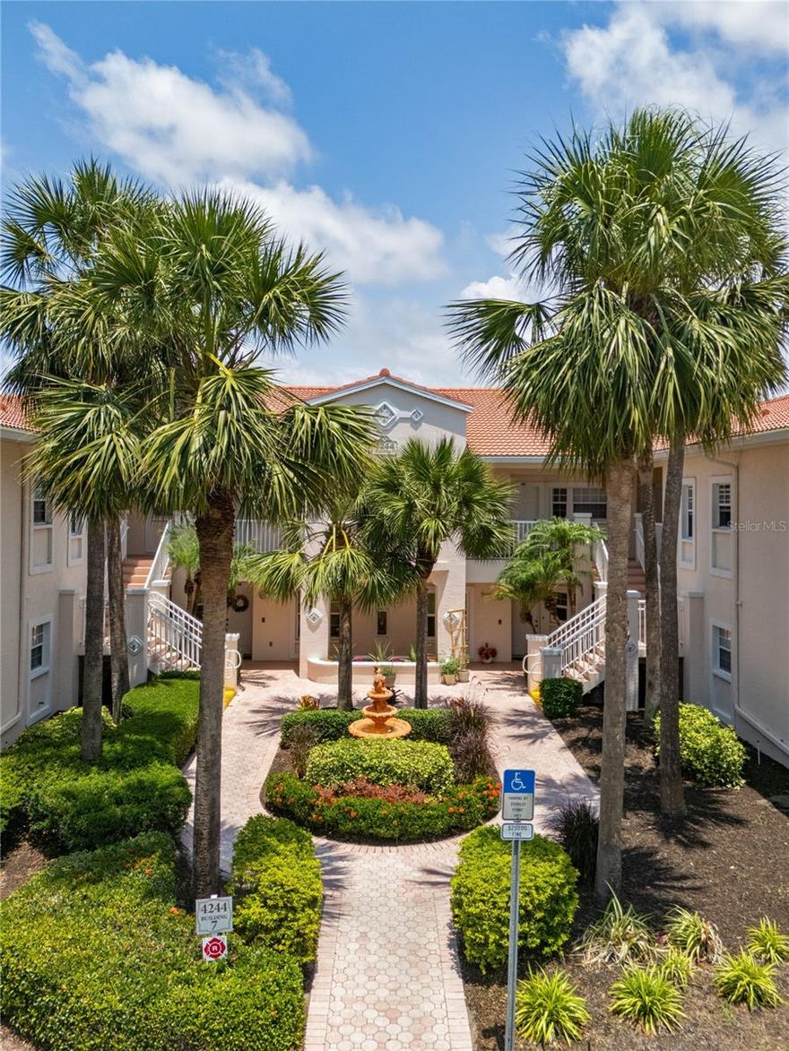 Live the Florida lifestyle in this beautifully updated condo located in the gated community of Plaza De Flores in Sarasota’s desirable Palmer Ranch. This bright and private corner unit features vaulted ceilings, an open layout, and tile flooring throughout with no transitions—including in the bedrooms—for a clean, seamless look. The kitchen has been tastefully renovated with quartz countertops, a stone backsplash, newer appliances, a modern sink, and ample cabinet and island space, making it perfect for both everyday living and entertaining. The split-bedroom layout provides comfort and privacy. The primary suite includes two walk-in closets, lanai access through sliding doors, and a fully remodeled en-suite bathroom featuring marble tile, a new glass shower door, new toilet, new lighting, and dual sinks. The guest bathroom features a new light fixture, faucet, hardware, and mirror. The guest bedroom offers vaulted ceilings and a large closet, making it ideal for visitors, a home office, or additional living space. Step outside to the peaceful 26-foot screened lanai, newly tiled and upgraded with new screens and ceiling fans, offering serene private views. The unit also features fresh paint throughout, updated lighting, ceiling fans in every room, a brand new tankless water heater, and custom blinds with recently added custom drapery that will convey with the sale. Plaza De Flores is a Mediterranean-style community featuring new roofs, lush courtyards, fountains, and beautifully maintained tropical landscaping. Residents enjoy resort-style amenities including a heated pool, hot tub, tennis court, fitness center, clubhouse with kitchen and library, and on-site management. The monthly maintenance fee includes basic cable, water, trash, sewer, recycling, on-site manager, pest control, and common area maintenance, providing convenience and peace of mind for residents. Located next to the Stoneybrook Nature Trail with direct access to the Legacy Trail, and just minutes from world-renowned beaches like Siesta Key, Nokomis, and Venice, you’ll also be close to Costco, shopping, dining, golf, and everything Sarasota and Venice have to offer. Living here places you perfectly between downtown Sarasota and historic Venice, allowing you to enjoy the best beaches, restaurants, culture, and shopping throughout the area. This move-in-ready condo is perfect for full-time living or a seasonal retreat—offering comfort, convenience, and the best of Florida’s Gulf Coast lifestyle.