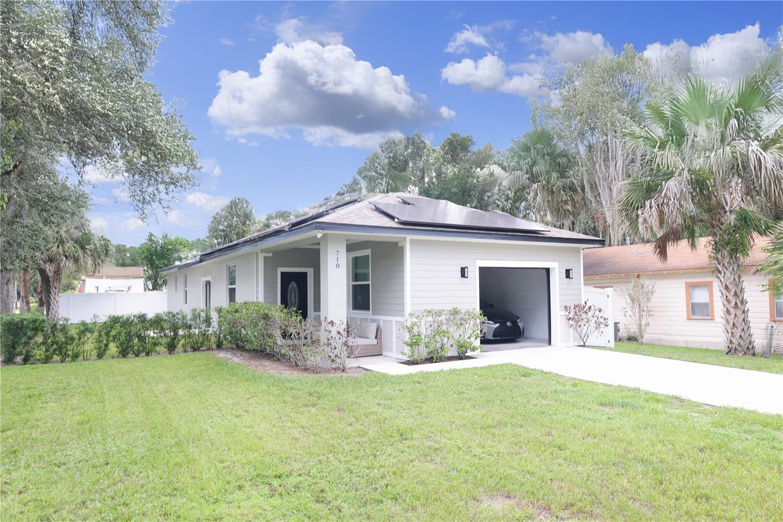 Welcome to this gorgeous 3-bedroom, 2-bathroom home on a prime corner lot, built in 2020 and loaded with modern upgrades! With over 1,400 square feet of open-concept living space, this move-in-ready gem is perfect for buyers seeking comfort, style, and location.
Step into the spacious living and dining areas where the brand-new Whirlpool appliance package shines in a thoughtfully designed kitchen—complete with granite countertops, plenty of cabinetry, and a large island ideal for entertaining. The master suite is privately tucked away at the back of the home and features a generously sized walk-in closet and a spa-like en-suite bathroom, beautifully finished with elegant white marble tile.
Additional highlights include laminate flooring throughout, central air & heat, ceiling fans, and a one-car garage with laundry hookup. The home also comes equipped with a Sonos sound system and security system for added comfort and peace of mind.
Enjoy the outdoors? A public park is located directly behind the home, offering green space and recreation just steps from your door. The location is unbeatable—just minutes to Downtown Sanford, Lake Monroe, dining, shopping, and major roadways.
Schedule your appointment ASAP—this one will not stick around long! Whether you're a first-time buyer or looking to downsize into something fresh and modern, this home checks all the boxes.