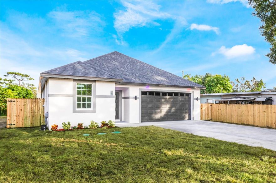 One or more photo(s) has been virtually staged. Beautiful new construction, modern, open floor plan with all the upgrades, move in ready, 4 bedrooms, 2 bathrooms and 2 car garage.  No HOA, Quartz counter tops on kitchen and bathrooms, walking in shower, walking in closet, tall ceilings. Fenced  back yard. 
Enclosed porch 23 x 14 on the back of the house. Fence with a door on each side, Close shopping centers, schools, hospitals, major roads 408,429,I4, turnpike, 20 minutes to Disney, 15 minutes to universal, 15 minutes to dawn town Orlando, 30 minutes to the Orlando Airport.