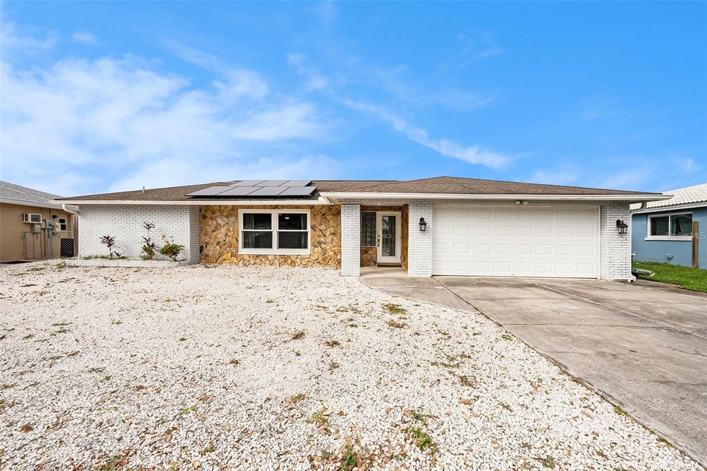 Photo of 1117 Rushmore Drive, Holiday, FL 34690 (MLS # TB8551484)