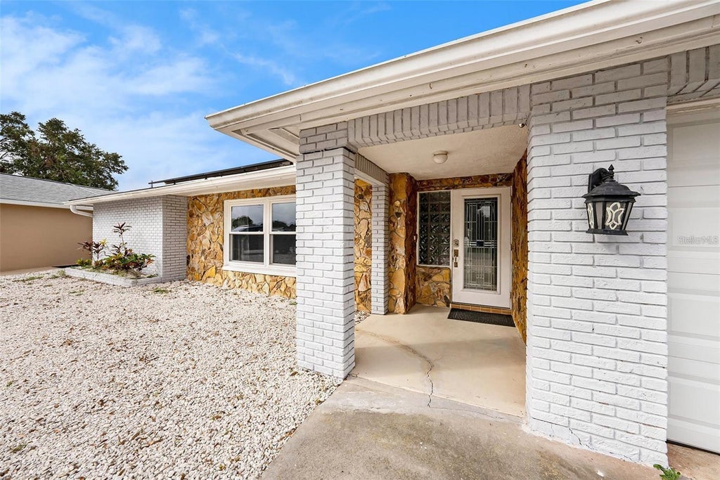 Photo of 1117 Rushmore Drive, Holiday, FL 34690 (MLS # TB8551484)