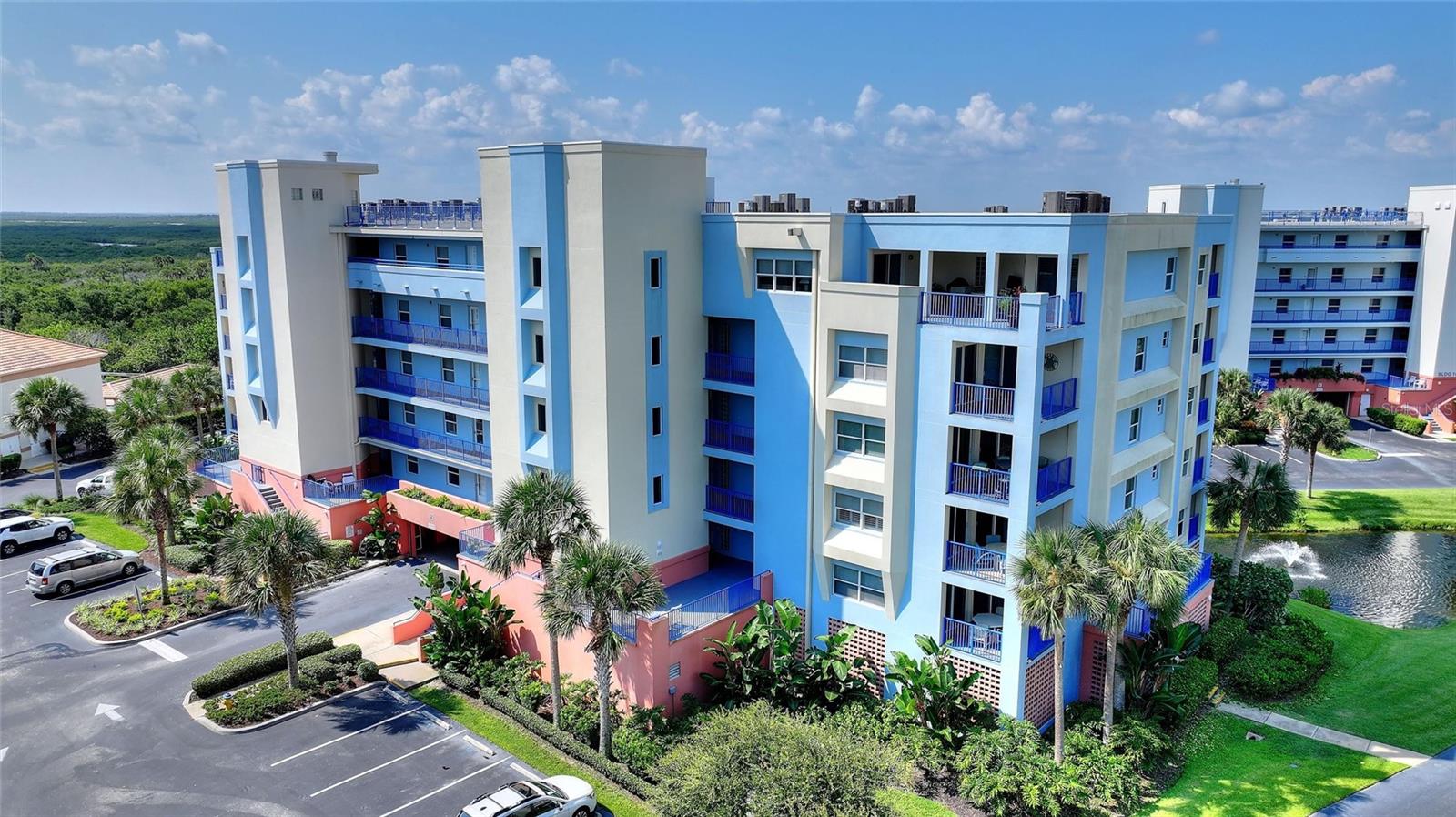 TOP FLOOR and FULLY FURNISHED 3BR/2BA Condo in Ocean Walk – Move-In or Rental Ready! Enjoy peace, tranquility and sunsets from your private screened balcony with stunning views of the estuary and nature preserve, plus direct views of rocket launches from Kennedy Space Center! Featuring an open floorplan great for entertaining or relaxing with guests after a day at the beach. The spacious primary suite has balcony access plus a walk-in closet and ensuite bathroom with shower, soaking tub and dual sinks. The kitchen offers stainless appliances and granite counters. There is an in-unit laundry room plus an exterior private storage closet for all of your beach toys! This condo has been a second home and has never been rented! Building 14 is one of the most desirable with immediate access to the pool and club house and a 5-minute walk to the private ocean walk beach crossover. Resort-Style Amenities Include: two cubhouses packed with amenities, 24-hour security, heated swimming pools & hot tubs, sauna & fitness centers, tennis, shuffleboard, bocce ball & basketball, dedicated safety beach crossover to the no-drive beach, under building gated parking and more! Located on A1A, just 2 miles from Canaveral National Seashore and 4 miles from Flagler Avenue’s shops & restaurants, Ocean Walk offers one of the most desirable beachside lifestyles in New Smyrna Beach. Don't miss this opportunity to own your beach getaway or turnkey investment!