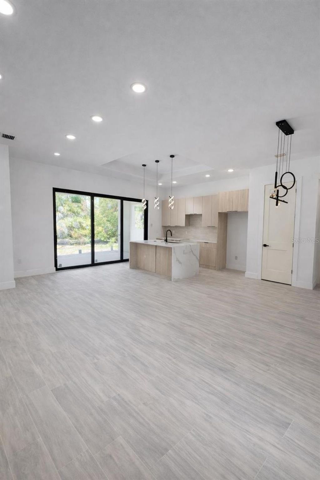 Photo of 1105 Cornelius Boulevard, Port Charlotte, FL 33953 (MLS # O6384136)