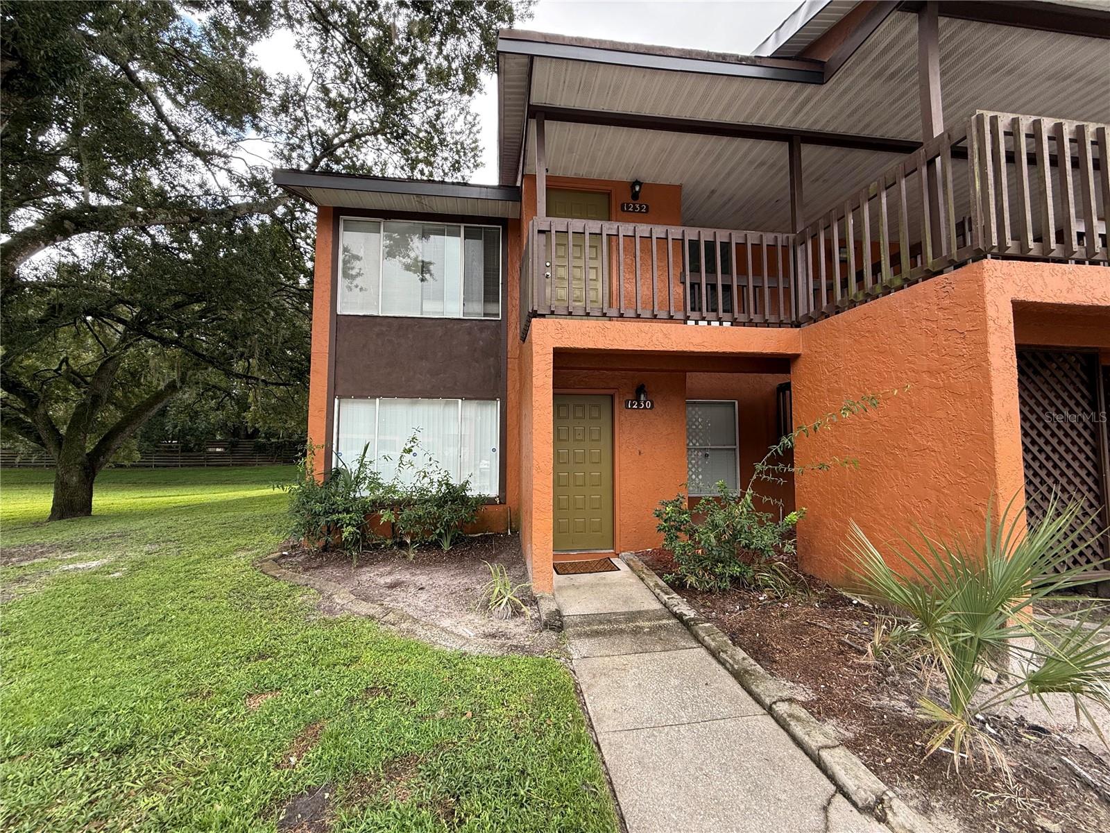 Welcome to Bermuda Palms Condominium! This spacious 2-bedroom, 2-bath corner end unit in the heart of Kissimmee offers comfort, convenience, and value. Featuring an open living and dining area, a well-sized kitchen, and a private balcony, this home is ideal for everyday living or as an investment opportunity. The primary suite includes an en-suite bath, while the other bedroom is perfect for guests and has extended closet space or a home office. The community provides residents with access to a community pool, clubhouse, and landscaped common areas. Located near major roads, highways, shopping centers, grocery stores, restaurants, gas stations, and much more. This property offers easy access to everything Central Florida has to see.