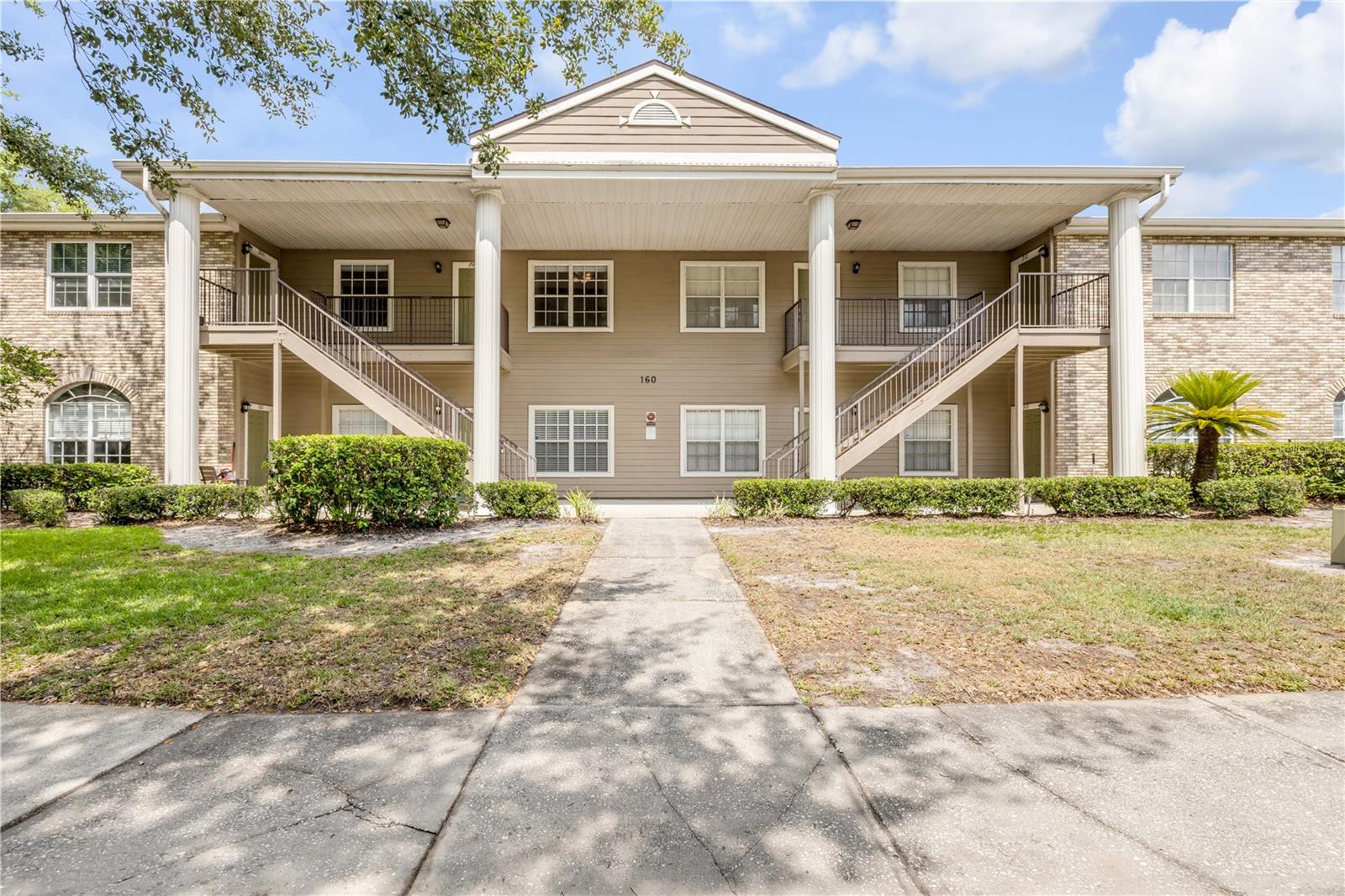 Conveniently located just minutes from UCF and within walking distance to grocery stores, restaurants, and Oviedo on the Park, this top-floor 2-bedroom, 2-bathroom condo offers comfort, convenience, and great amenities. The unit features vaulted ceilings, new privacy blinds, in-unit washer and dryer, and a screened balcony with an outdoor storage closet. The primary bedroom includes a walk-in closet and en-suite bath, while the second bedroom and bath provide ideal space for guests or roommates. Enjoy access to a large swimming pool, fitness center, tennis courts, and a basketball court. AC replaced in 2015. Comes with a deeded parking spot plus open guest parking. Located close to Orlando International Airport and just an hour from the beach—this is easy Florida living!