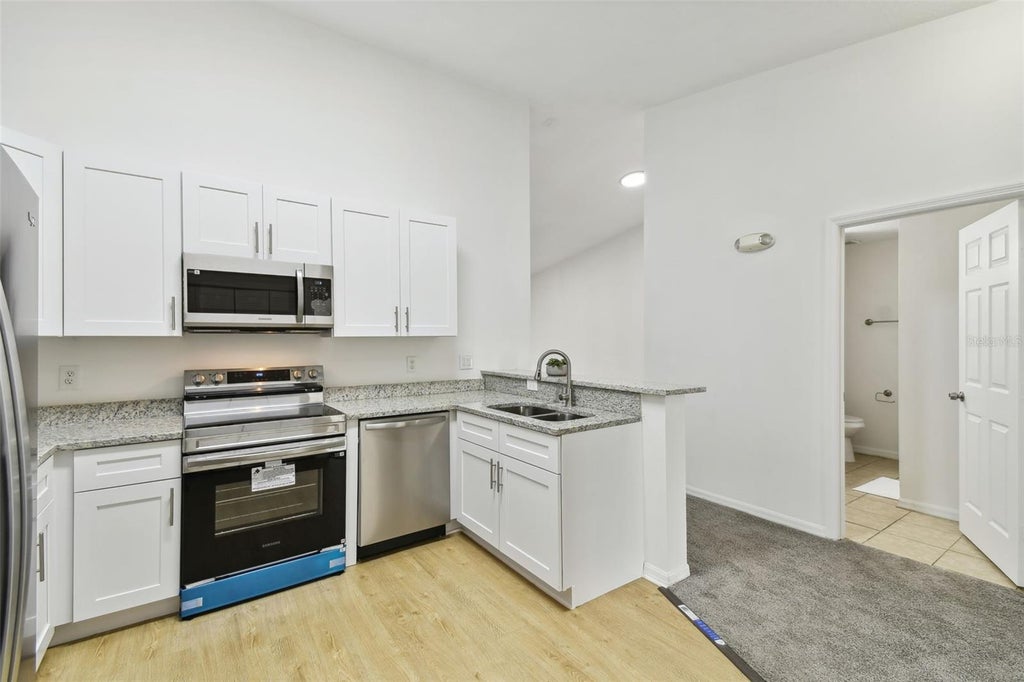 Photo of 8827 Grand Palms Circle #B, Kissimmee, FL 34747 (MLS # O6437157)