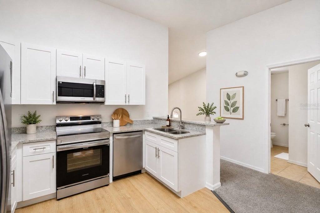 Photo of 8827 Grand Palms Circle #B, Kissimmee, FL 34747 (MLS # O6437157)