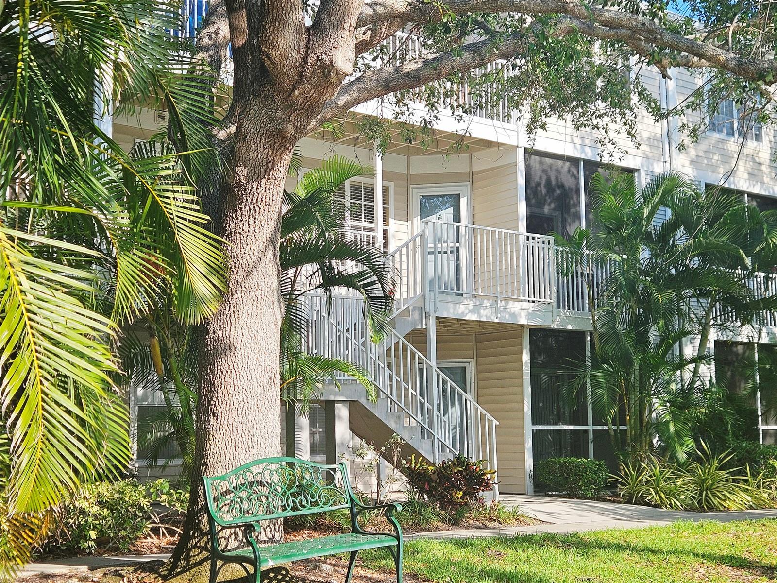 The best of the best! Central Park II is already the best-kept secret in Sarasota: Where else can you live steps from downtown and have access to country club amenities, water and a bike path to Venice? This particular unit has the best location within the complex. It's tucked off the road with a full view of the pond, pool and court--and even positioned close to the Hudson Bayou. Kayaking, fishing, tennis, pickleball, swimming--and the popular Legacy Trail for bikers or hikers. The condo association is in good financial condition with fully-funded reserves and all state-required inspections completed and results addressed. This is the largest floor-plan in the community with two lanais, two ensuite bathrooms and a half-bath downstairs. Ample storage space in the unit's 7 closets. It has updated living and kitchen areas with crown molding throughout. Enjoy the shaded view of the pond from the park bench at the base of your outside stairs. Monthly fee covers a lot: Exterior insurance, streaming TV, high speed internet, water, sewer, trash/recycling pickup, exterior building maintenance, grounds and recreational facility maintenance and a reserve fund.