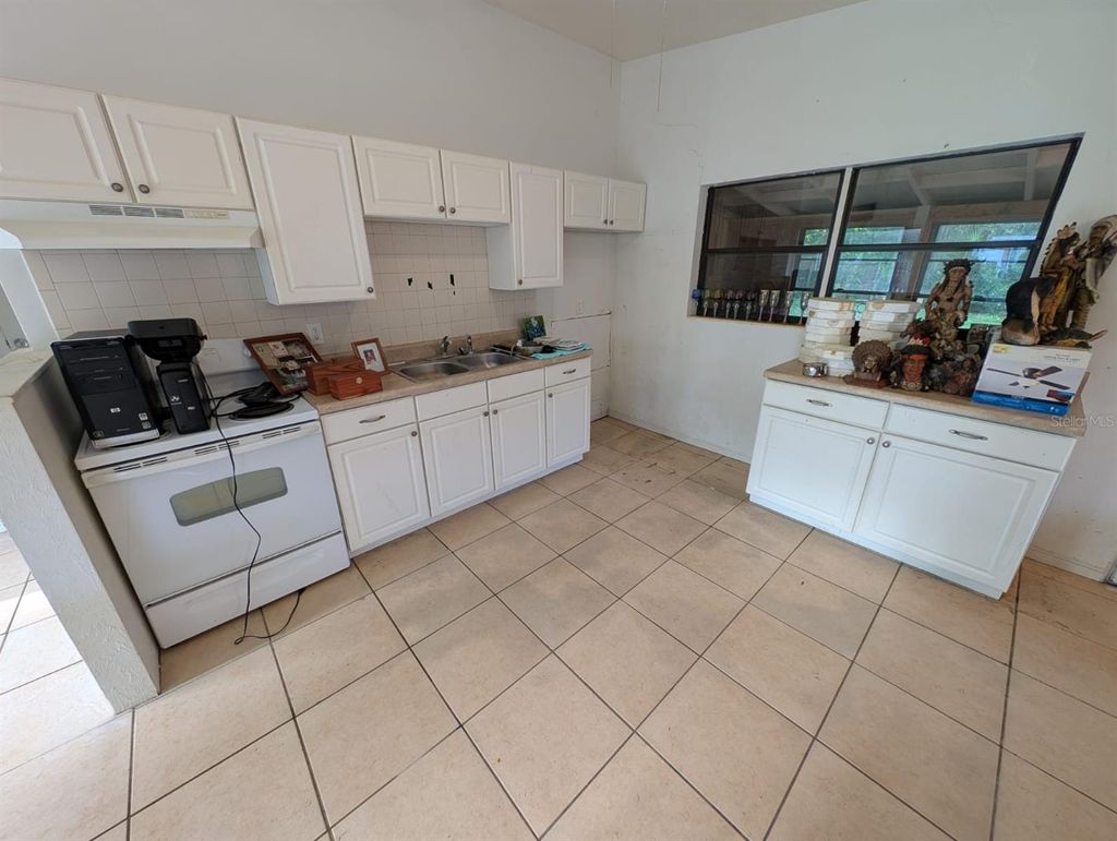 Photo of 765 Greenway Place, Daytona Beach, FL 32114 (MLS # O6353276)