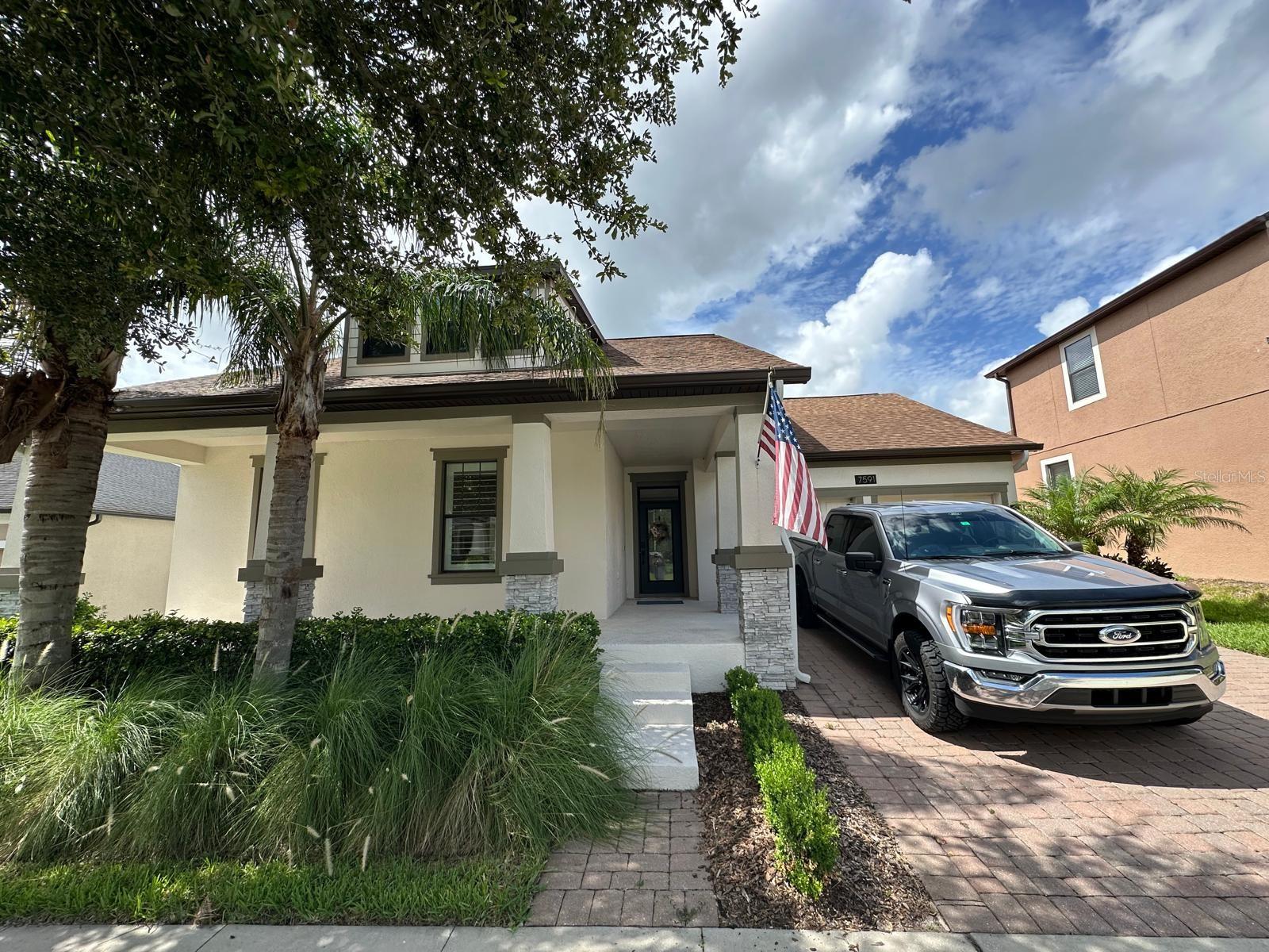 Step into modern comfort with this beautifully upgraded 4-bedroom, 2.5-bath, 3-car garage SMART HOME in the highly desirable Summerlake community. Built in 2016, this home features a spacious open floor plan with luxury vinyl plank flooring, plantation shutters, smart LED lighting, and custom California Closets throughout. The gourmet kitchen is a showstopper, offering 42” espresso cabinets with soft-close doors, GE Profile stainless steel appliances, a GAS range, ultra-quiet BOSCH dishwasher, Silestone quartz countertops, a Delta Touch faucet, and a deep BLANCO sink. The oversized island easily seats 4+—perfect for entertaining. The casual dining area and elegant powder room add to the home’s welcoming layout. Retreat to the completely remodeled primary suite, featuring wood plank flooring, LED chandelier, spa-like SUPER SHOWER with rain head and custom glass enclosure, luxurious KOHLER soaking tub, dual quartz vanities, and a dream walk-in California Closet system with drawers, hampers, and shoe storage. Three additional bedrooms offer modern lighting, upgraded closets, and a beautifully updated full bath ideal for guests or family.