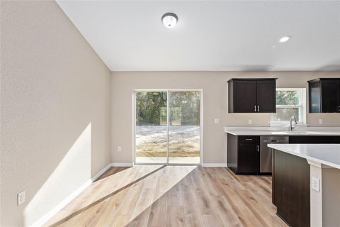 Tiny photo for 9299 N Hunter Way, Dunnellon, FL 34433 (MLS # OM725175)