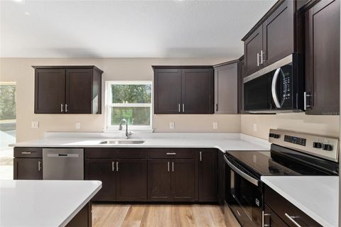 Tiny photo for 9299 N Hunter Way, Dunnellon, FL 34433 (MLS # OM725175)