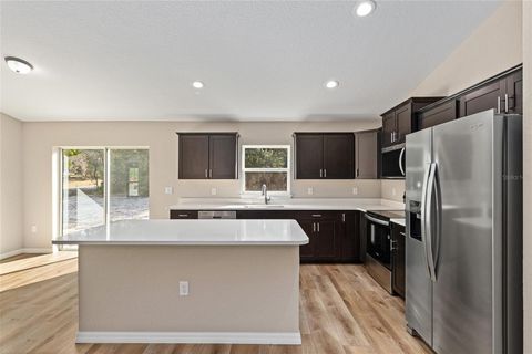 Tiny photo for 9299 N Hunter Way, Dunnellon, FL 34433 (MLS # OM725175)