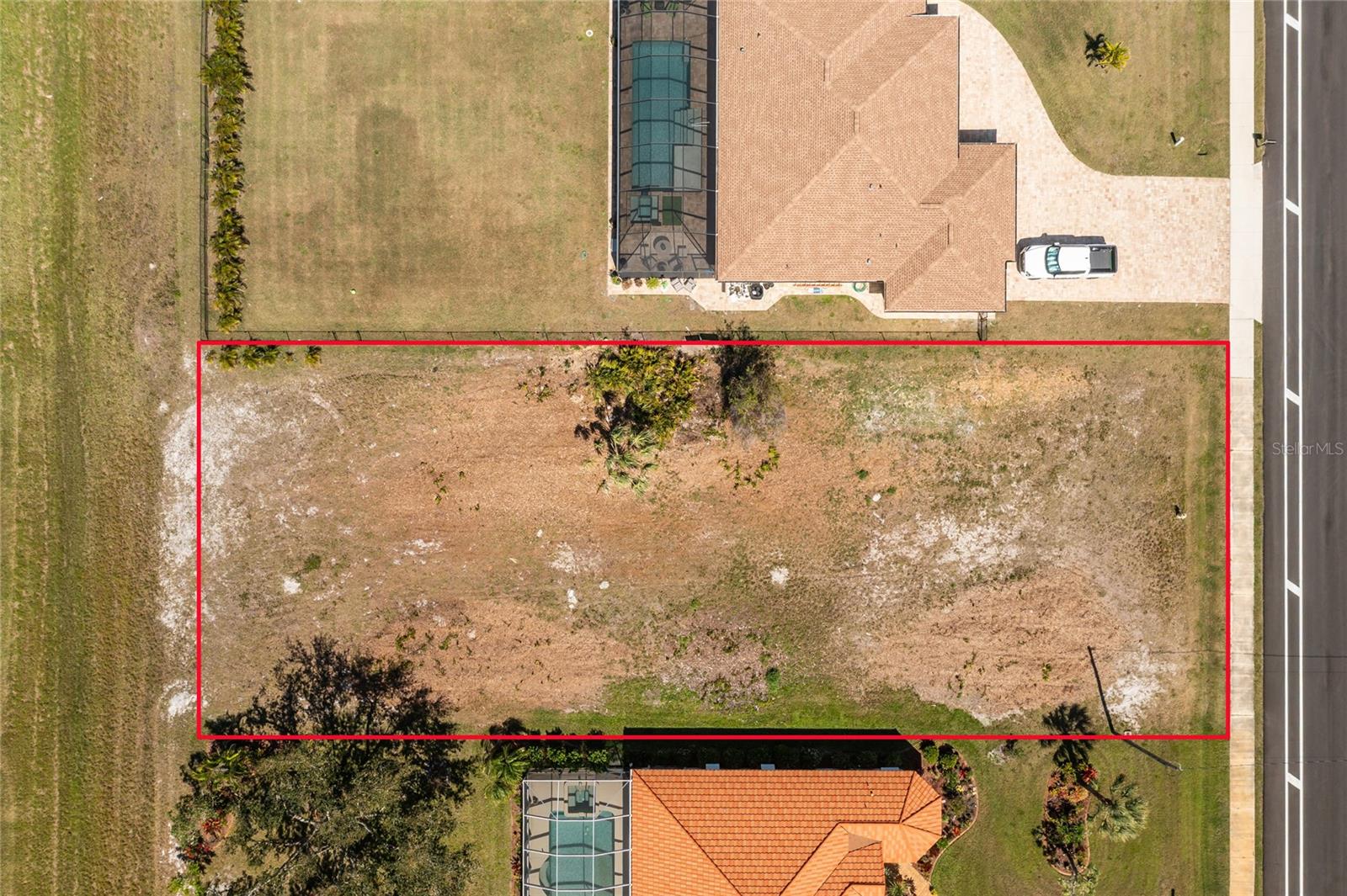 BEAUTIFUL, RECENTLY CLEARED OVERSIZED BUILDABLE LOT, 80 FT., ACROSS the FRONT & BACK, & 200 FT. DEEP (16,000 Sq. Ft/0.37 Acres), with a 50-ft. GREEN BELT BEHIND THE LOT FOR ADDED PRIVACY! THIS LOT IS HIGH & DRY, IN AN X-ZONE, AND FLOOD INSURANCE IS NOT REQUIRED. This property has a Southern back exposure so you will enjoy the sun in your pool all day, with beautiful sunsets! Rotonda West is a highly sought-after Golfing Community with 5 Golf Courses and much to do here, along with Boating, Fishing, Tennis, Pickleball, Hiking, Parks, Playgrounds, Clubs, & Groups. On the southwest coast of Florida, Rotonda West is a lovely, Established Community in a Picturesque area known as Cape Haze. Our community is the perfect size to make new friends, get involved in many activities, and enjoy various outdoor recreation. Residents chose our Tranquil neighborhoods for their new homes, moving here from virtually every state in the union and internationally. Twenty-six miles of canals, ponds, and lakes are abundant with fish and wildlife. We also have an Aquatics Committee to enhance the wildlife and habitat. Nature Lovers can see the Merlin, a medium-sized Falcon that migrates here in winter, Songbirds, Mockingbirds, Cardinals, and Blue Jays! Boating is popular in Lemon Bay and around Boca Grande. The nearby Gulf of Americia offers some of the best Fishing in the world. It is close to several of our Local Sandy Beaches nearby, Boca Grande, Englewood, and Manasota Key, which are great for Shelling and finding Shark Teeth. We are close to Marinas, Fine Dining, and Specialty Shops. Close to the Charlotte Sports Park welcoming Tampa Bay Rays, Atlanta Braves Spring Training, Warm Mineral Spring, and Aquatic Center. Close to several Airports as well. There is so much to do and so little time. What are you waiting for?