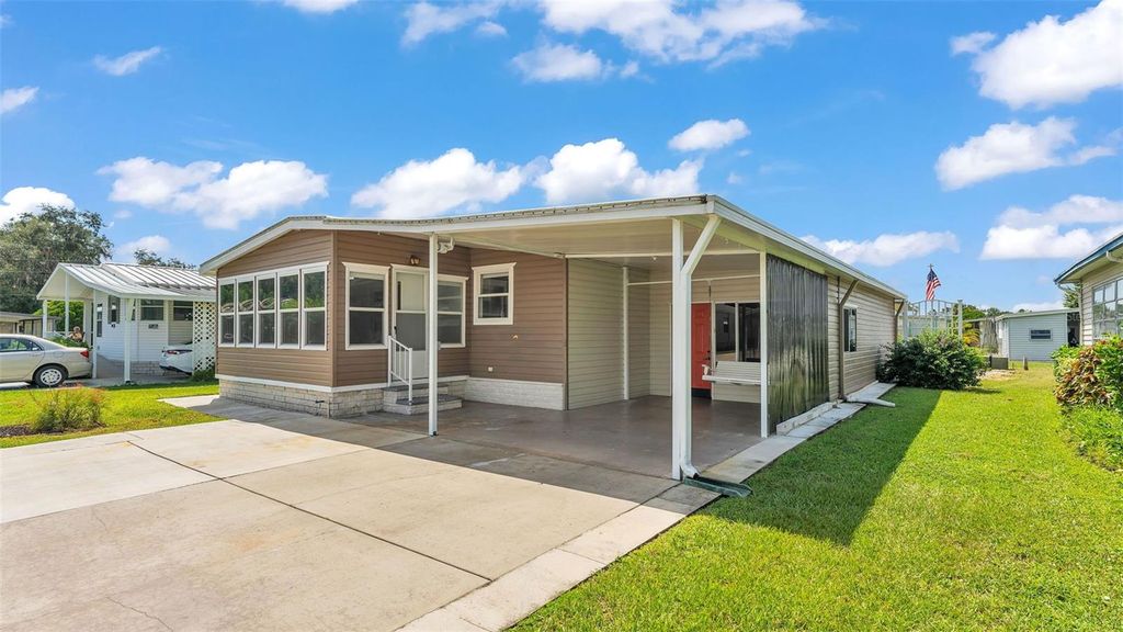 Photo of 34704 Sweetpea Lane, Zephyrhills, FL 33541 (MLS # L4955063)