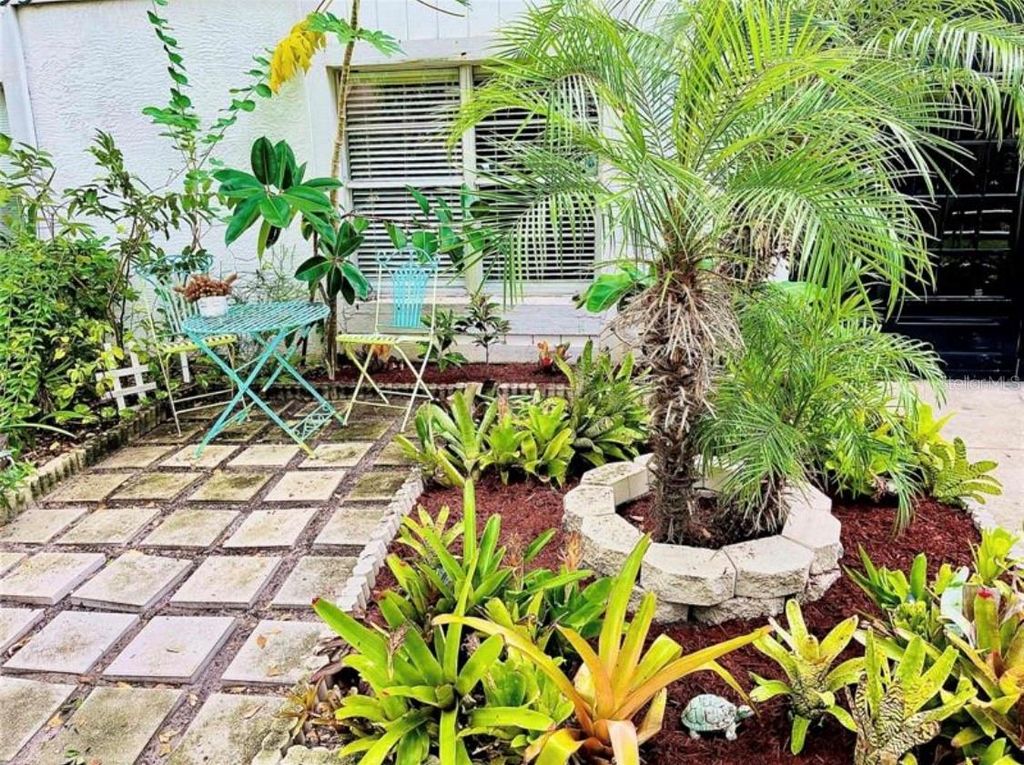 Photo of 3595 Whispering Oaks Lane #57, Palm Harbor, FL 34684 (MLS # TB8479222)