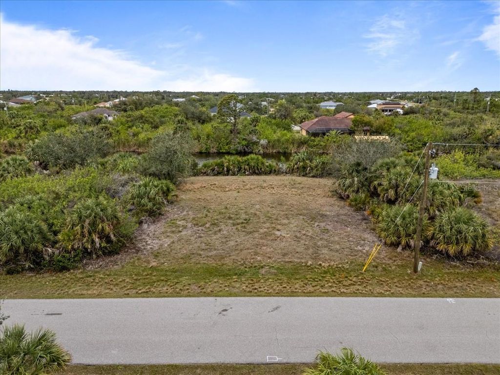 Photo of 9554 Melody Circle, Port Charlotte, FL 33981 (MLS # A4641854)