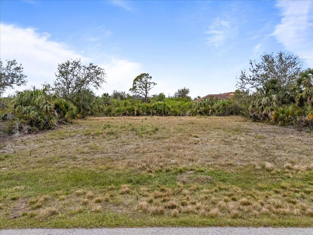 Photo of 9554 Melody Circle, Port Charlotte, FL 33981 (MLS # A4641854)