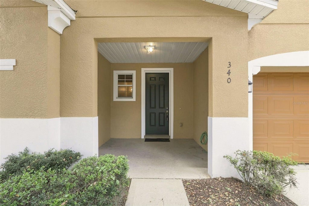Photo of 340 Golden Dewdrop Way, Oviedo, FL 32765 (MLS # OM730482)