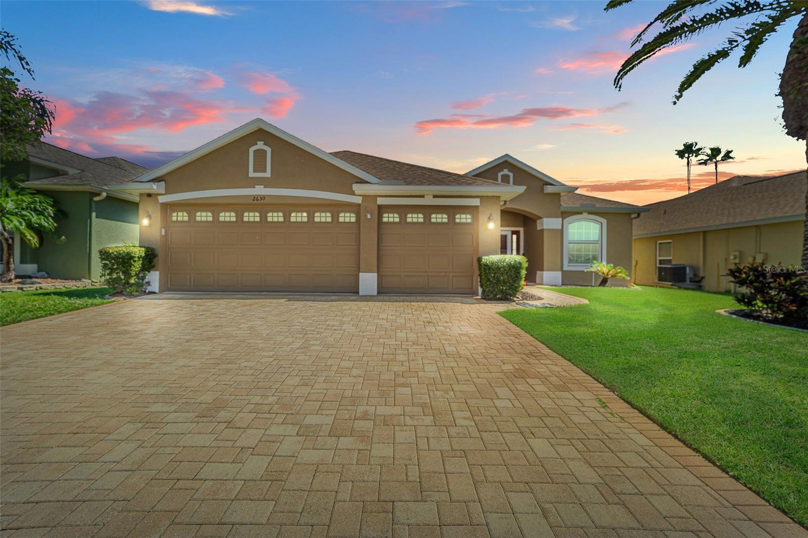 Welcome to this stunning 3 bedroom, 3 bathroom home with a versatile bonus room, 3-car garage and sparkling saltwater pool, located in the desirable Key Vista gated community in Holiday, FL. This beautifully updated home offers just under 2,000 sq. ft. of living space and has been thoughtfully upgraded throughout, featuring a 3-year-old roof, updated water heater (2023), newer windows, quartz countertops, stainless steel appliances, updated flooring, lighting, and fixtures. A striking floor-to-ceiling decorative stone wall with an electric fireplace and mantle reclaimed from the original Armature Works building in Tampa creates a warm and elegant centerpiece in the living area. The open kitchen flows seamlessly into the dining and living spaces, while sliding glass doors lead to the covered patio and screened saltwater pool with a rare full pool bath, this home is perfect for entertaining. The private master suite includes a walk-in closet, double vanities, a beautifully renovated shower, and direct pool access. The versatile bonus room can easily serve as a 4th bedroom, office, or den.
Living in Key Vista means enjoying resort-style amenities including a clubhouse, heated pool, hot tub, tennis and pickleball courts, volleyball,  fitness center, playground, and optional RV/boat storage available for purchase. Surrounded by nature preserves and parks, you’ll have easy access to the Anclote Coastal Trail, Anclote Park with beach and boat ramp, Key Vista Nature Park, and Anclote Gulf Park with dog park and fishing pier. Just minutes to the Historic Tarpon Springs Sponge Docks, award-winning beaches, dining, and shopping, this home offers the ultimate Florida lifestyle with a low HOA fee and no flood insurance required. Schedule your showing today!