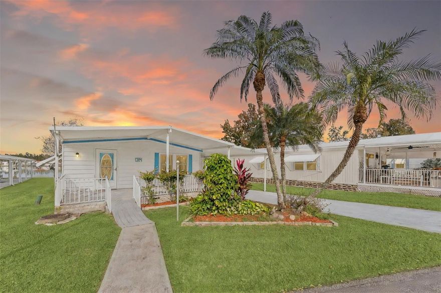 Dreaming of Living on the Lake? Well, let's make your DREAMS come true. This adorable home features 2 Bedrooms, 2 Bathrooms, Large Living room, Dining Room combination. Kitchen with updated appliances, Large Florida room with tons of natural light and views of the Lake. Newer Roof, Newer HVAC, Bamboo Flooring, Beautiful covered front porch perfect for entertaining friends after a Golf game. Storage Shed for all your extras. Kove Estates a vibrant 55+ Co-Op community, friendly active environment offering resort-style living in a gated Golf Course community. As a resident of Kove Estate, you will enjoy free 9-hole golf, two pools, tennis courts, pickleball, community events, Clubhouse, Library, Beautiful Lake Sunsets. The community is conveniently located off SR415, minutes to Sanford, Deltona, New Smyrna Beach, close to shopping, dining, medical facilities, and attractions such as the Daytona International Speedway, the Kennedy Space Center, and the Orlando theme parks. Perfect for anyone looking for a peaceful and convenient lifestyle. Call today to view!