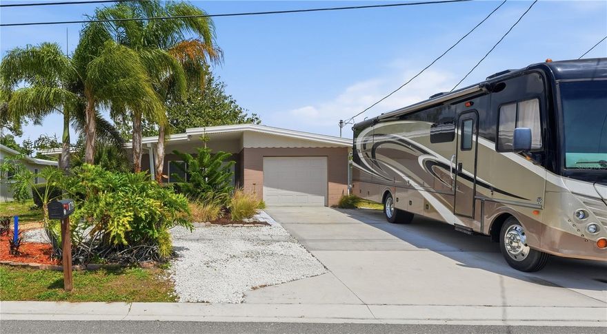 Welcome to your waterfront retreat in the heart of Palm Harbor, where everyday living feels like a getaway. This updated two-bedroom, two-bathroom home sits along a canal leading directly to Lake Tarpon - perfect for boating, fishing, and enjoying Florida’s outdoor lifestyle right from your backyard. Inside, you’ll find a bright, open floor plan designed for both comfort and functionality. The living room and kitchen flow seamlessly together, creating an inviting space for entertaining or relaxing. The remodeled kitchen is a standout feature, offering granite countertops, state-of-the-art appliances, abundant cabinetry, and charming banquet seating with built-in storage - ideal for maximizing space and organization. The home features wood-look vinyl flooring throughout, along with upgraded windows and doors that enhance both style and efficiency. Both bedrooms are generously sized and share a well-appointed full bathroom with a large vanity and a tub/shower combination. Step outside to your private wooden deck overlooking the canal - an ideal spot for morning coffee, evening unwinding, or hosting guests. With direct water access, you can easily park your boat and head out to Lake Tarpon for a day of recreation. Located in a highly desirable Palm Harbor area, this home is just minutes from a variety of dining, shopping, and everyday conveniences. Whether you're looking for a full-time residence or a waterfront escape, this property offers the perfect blend of comfort, updates, and an unbeatable location for enjoying Florida’s lake lifestyle.