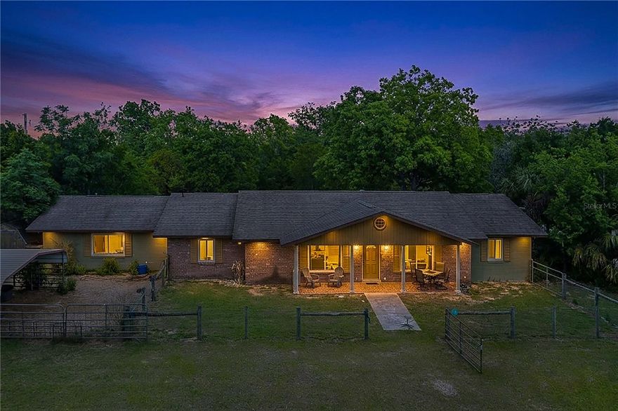 Spacious country living meets modern updates in this impressive 1972 ranch-style home offering over 3,300 sq. ft. of living space on 5 beautiful acres. This 4-bedroom, 2-bath home features oversized rooms throughout, providing plenty of space for comfortable living and entertaining. Step outside to enjoy your own private retreat with an in-ground pool, recently resurfaced in 2024, complete with a pool fence (2021), fire pit, and a scenic nature walk. The property is fully fenced and ready for your horses and farm animals, with ample room to roam.

A versatile block building adds even more potential for storage, workshop, or future projects, along with convenient 50-amp and 30-amp RV hookups. This home has been thoughtfully updated over the years, including a roof and windows (2015), two A/C units (2018 & 2019), updated electrical and panel (2022), master bath renovation with plumbing (2022), new ductwork (2025), new insulation (2026), well pump (2025), water softener (2025), septic pumped (10/2025), and pool pump (2025). All windows are equipped with hurricane fabric for added peace of mind.

Enjoy the perfect blend of privacy and convenience with this exceptional property, located just minutes from shopping, medical facilities, and schools. A rare opportunity to own a well-maintained mini-farm with room to grow!