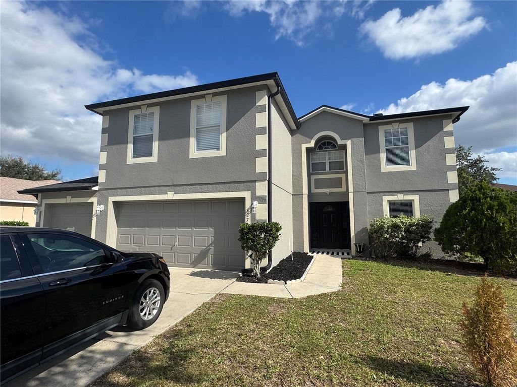 Photo of 627 Woodland Creek Boulevard, Kissimmee, FL 34744 (MLS # S5138644)