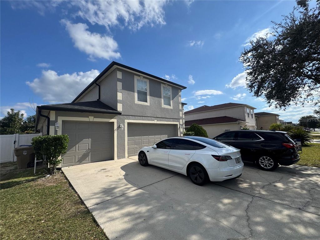Photo of 627 Woodland Creek Boulevard, Kissimmee, FL 34744 (MLS # S5138644)