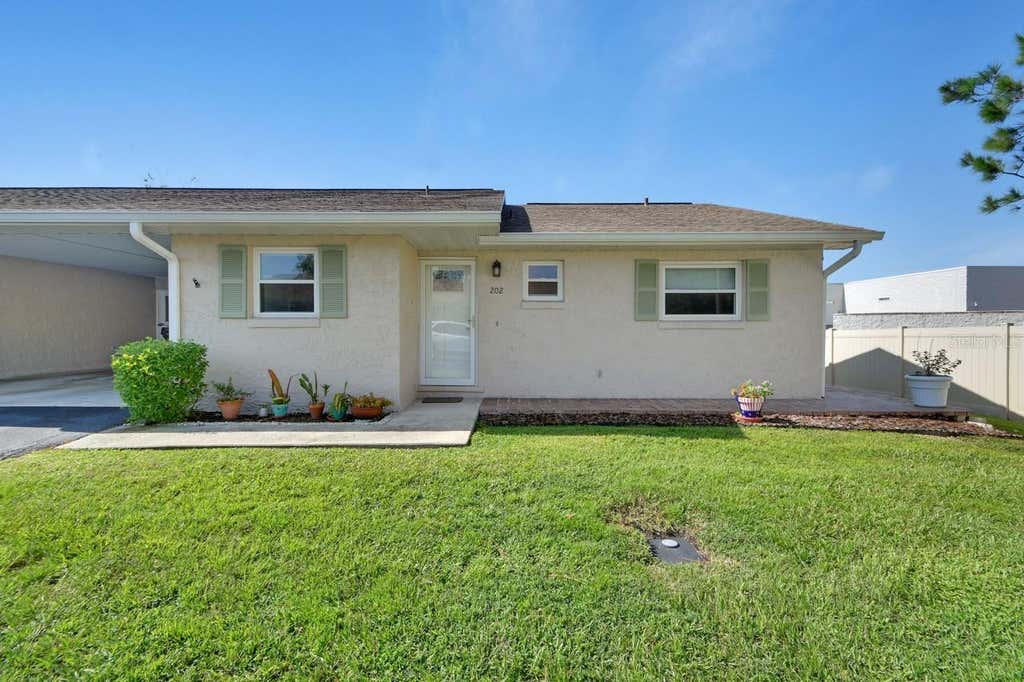 Photo of 202 Elmwood Avenue #330, Deland, FL 32724 (MLS # V4950657)